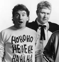 a black and white photo of a group of men in t - shirts